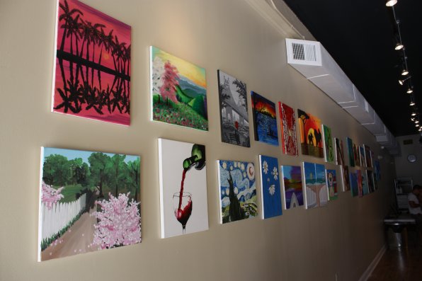 A sampling of some of the paintings offered at Cork and Canvas.