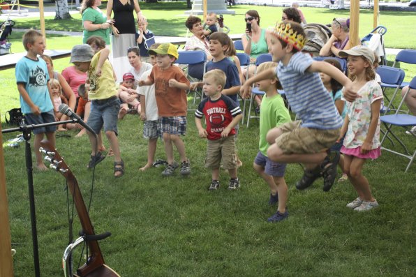 A group of children bounce to the “kangaroo hop.”