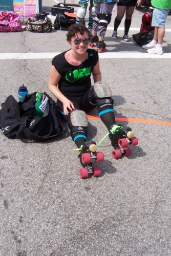 Paul catches one of the Granite State Roller Derby gals.