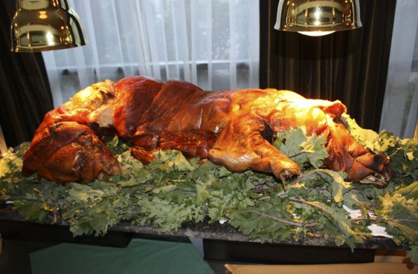 whole roast pig on mouthwatering display.