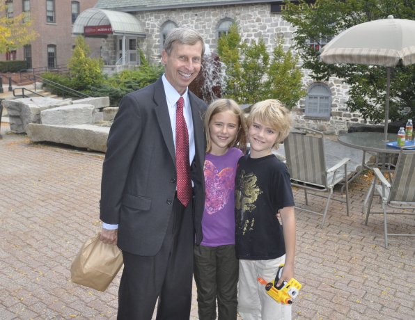 Look who we spotted in Eagle Square. Gov. John Lynch took a moment out of his busy schedule to share his favorite parts of fall. “The foliage and the colors, and the temperature,” he said. “I love it when it’s 80 during the day and 40 at night, with no humidity.” Above, Lynch shares a moment with Ross and Ava McGowan, both 7. Ross and Ava – whose grandfather was the architect of Eagle Square – said they like playing in leaf piles.