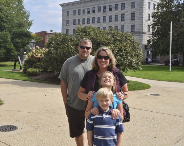 The Reuning family stopped in Concord as part of a tour of several New England states. From back, Scott was looking forward to football, Sheila and 9-year-old Jessica prefer the colors on the trees, and 7-year-old Christopher likes raking (score, parents!).