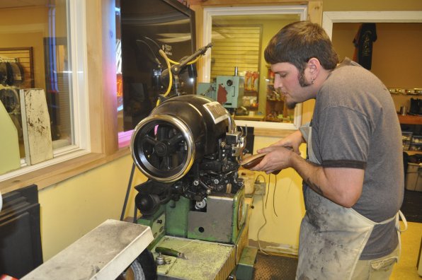 D.J. Annicchiarico puts a cobbler’s touch on a shoe repair. His shoe repair shop has been in Concord for 102 years.