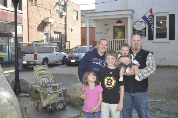 Melissa Palys (back left) would add more outside seating and picnic tables, while Matthew Crochmal (back right) of Bedford was so enamored with the city he said the only thing he’d change would be moving to Concord. Ten-year-old Shane Riley, 5-year-old Samantha Riley and 6-month-old Daniel Crochmal were just happy to be there.