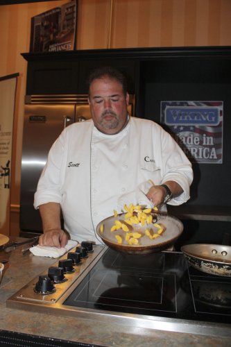 Scott Oulette of O Steaks and Seafood tosses some pumpkin bits.
