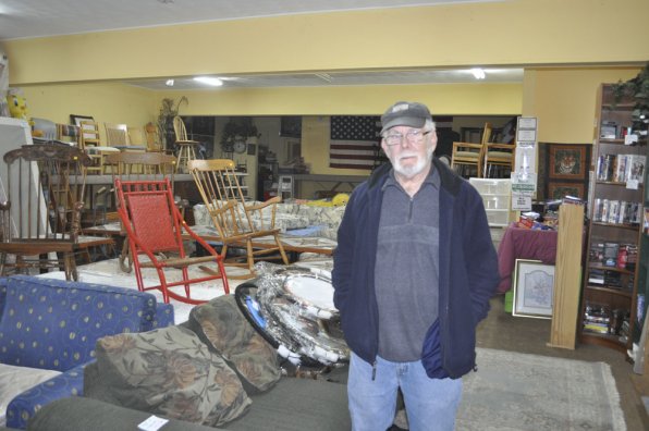 Need a chair on top of a mattress behind some couches? Chuck Marshall’s got you covered at Chuck’s Used Furniture.