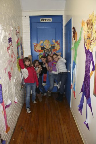 Alyssa Neal, Jianna Ascani, Leanna Bastarache, Grace Milliken and Kara Larrabee strike a pose during an afterschool Girls Inc. session at the Green Street Community Center.