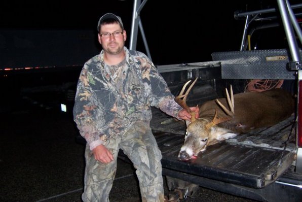 Adam Earle of Loudon with an eight-point buck.