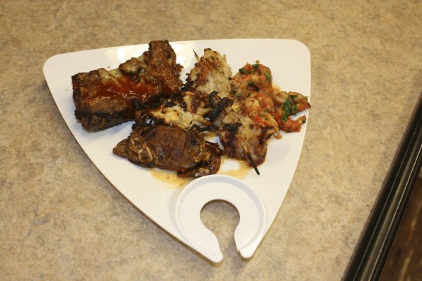 A delicious plateful of ribs,  softshell crab and grilled alligator with crawfish salsa. If only the Food Snob had been in attendance!