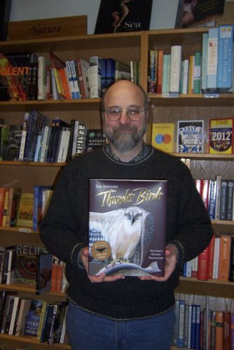 Gibson’s Bookstore manager John LeDonne holds a copy of “Thunder Birds” by Jim Arnosky.