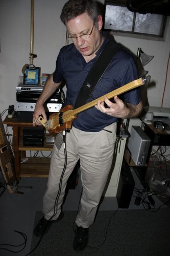 David Kontak plays his hurdy-gurdy -inspired crank-action "guitar."