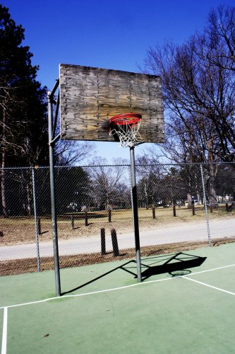 <strong>Rollins Park</strong>, off of Broadway, is a great place to go if you want to try and dunk. Unfortunately, we say that because one of the rims is noticeably lower than the standard 10 feet. Also, the backboards are made of plywood. Not ideal.