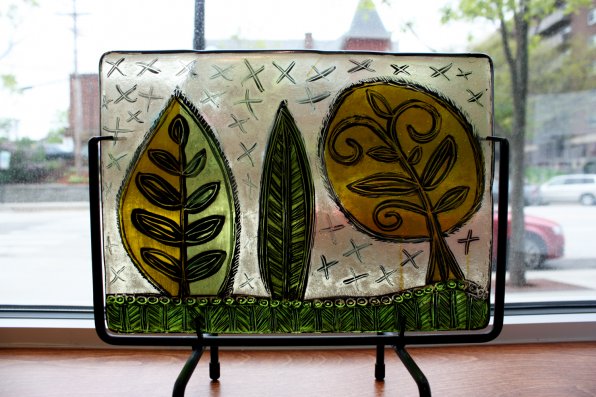 “A New Leaf” by Judith Copeland, painted on fused glass.