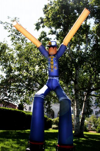Sure, we’ve seen a wacky waving-arm inflatable flailing tube man before, but a wacky waving-arm inflatable flailing tube man in a Boy Scout uniform? That’s a new one.