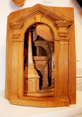 “Diorama” by John Magnan, maple and oak. This is a “growth ring carved wood book” – each “page” curves and curls just as it grew in nature.