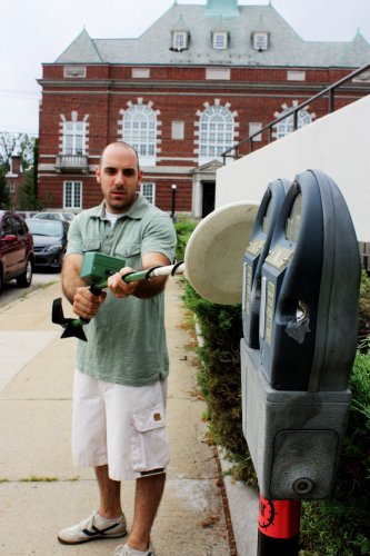 We had another potential score outside City Hall; according to the metal detector, this antique device was full of coins! Unfortunately, just as we were about to take a shovel to it, a parking enforcement officer happened by and we wandered off whistling innocently.