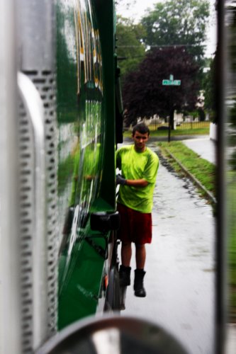 Next, the garbage truck swings by and a Bestway laborer, like Nik LeGrow, hops off to scoop up your bags and chuck ’em in the truck. In a typical day, LeGrow picks up anywhere from five to 10 tons of garbage – all by himself!