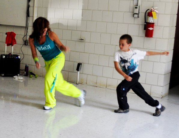 Looks like the moves run in the family! That’s 8-year-old Lucas keeping up with mom and instructor Mariann Puopolo.