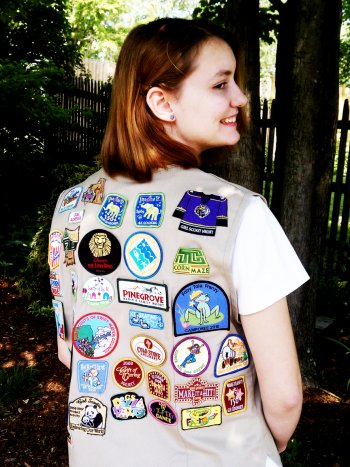 Fun fact about Elizabeth - she can spin her head 360 degrees! Oh, wait - she's just got a backful of merit badges.