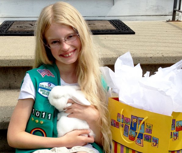 Girl Scout Sarah Whittier and her pet bunny, Skye.