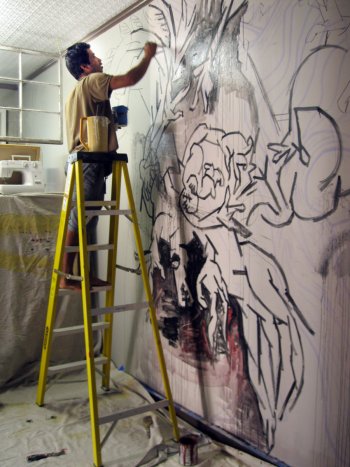 Youdhi Maharjan works on his mural after whitewashing Paradis’s.