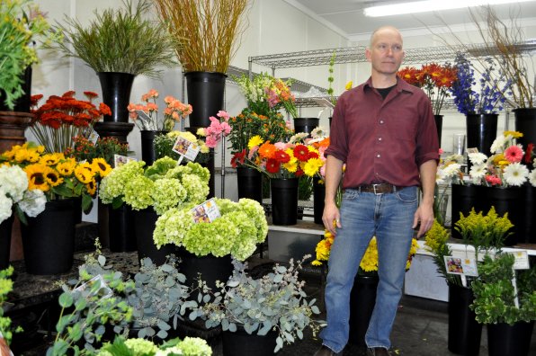 Brad Towne in his floral display area. What do you think he’s gazing wistfully at? Give up? It was flowers!