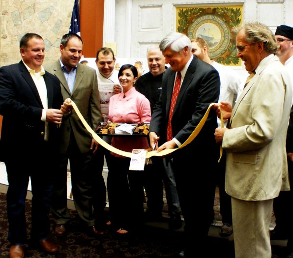 George Bald cuts the pasta ribbon to officially ring in Restaurant Week in New Hampshire.