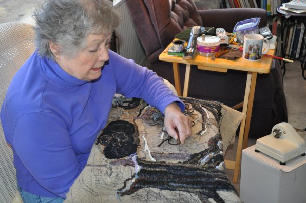 Ann Winterling shows off her world-famous rug-hooking technique.
