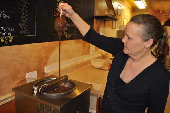 Audrey Little shows us how one of her signature confections, the candy apple, is made.