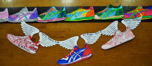 Three special shoes, with wings attached, were colored in honor of the three people who died as a result of the bombing.