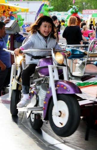 Aaliyah Nolin, 4, pops a mean wheelie.