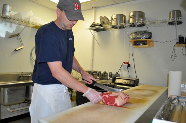 Rob Darling cuts that meat at Concord Beef and Seafood.