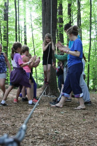 Working the low ropes course is all about trust.