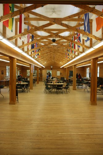 The dining hall is decked out like the United Nations – there’s a flag from every country that boasts a native counselor.