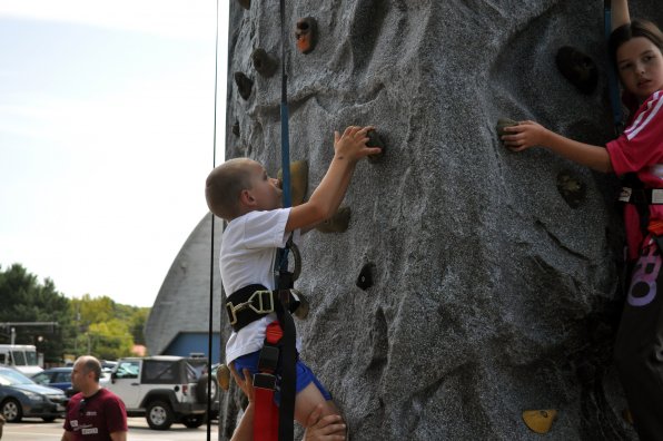 Connor Porter scales the rock wall.