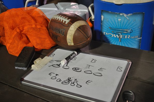 A football game tableau. On a table.