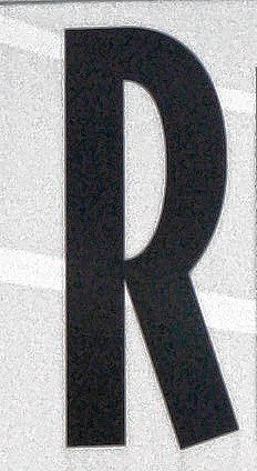 9. We have an idea for a movie: a Concordian wins a scavenger hunt by identifying this R at Red River Theatres.