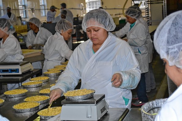 The staff has certainly grown at Blake’s All Natural Foods – it’s not easy cranking out 25,000 meals a day – but the ingredients remain wholesome and fresh. Also, look at all that mac and cheese!