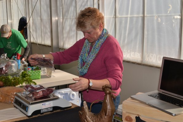 Cindy Canane of Cascade Brook Farm weighs out some tasty looking Black Angus beef.