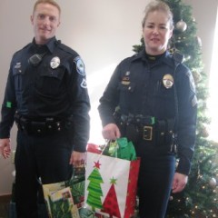 Concord police deliver presents for Holiday Tree