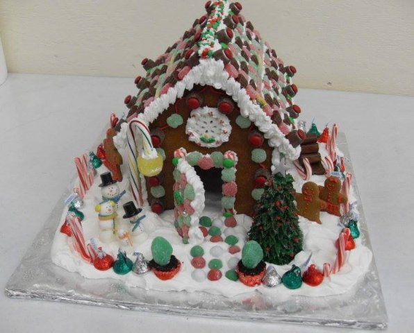 A sweet candy cane and gumball light post and family of snowmen. (adult workshop)
