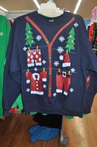 It’s equally hard to beat the faux-button middle of the blue sweater, which also features Santa’s hanging laundry, jolly boxers and all.