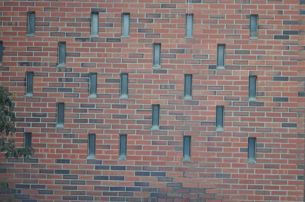 8. This pleasant church features this brick wall, which apparently includes all the tiny windows in the entire universe.