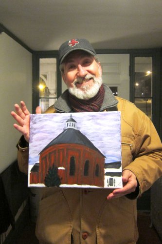 Byron Champlin displaying his gas house painting.