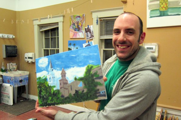 Why is Keith smiling so much? We’re not totally sure, but we have to assume it’s because he’s picturing hordes of people bidding thousands of dollars for his painting during the Locally Famous Art Auction as part of Intown Concord’s annual general meeting March 13.