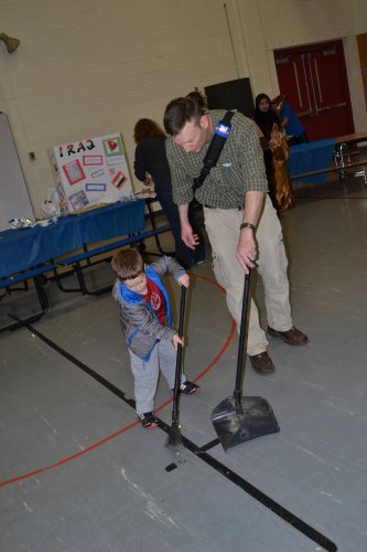 Grady Brown helps his dad, Bob, do a little sweeping. Maybe Grady could help us tidy up the Insider pod.
