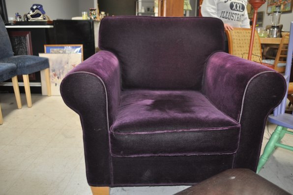 This chair ($150) at Encore Furnishings on Broadway may or may not be made of real Grimace hide.