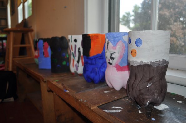 Some of the art work produced by campers, made out of soda bottles.
