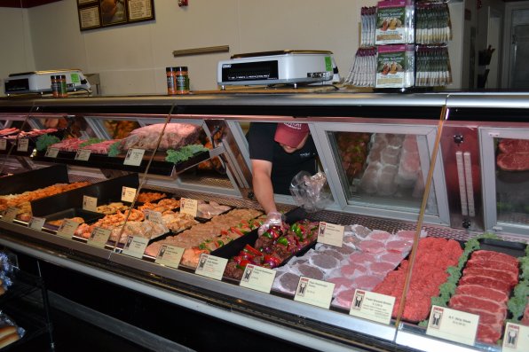 Wine’ing Butcher meat manager Loren Smith will weigh out some steak kabobs for you too!