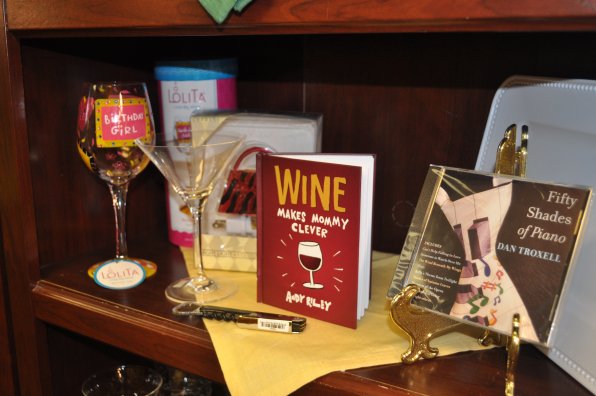 Back to school isn’t only for kids, though, and that’s why we highlighted the above book and glass display, because we agree that wine makes mommy clever. And back to school shopping makes mommy need even more clever juice than usual.